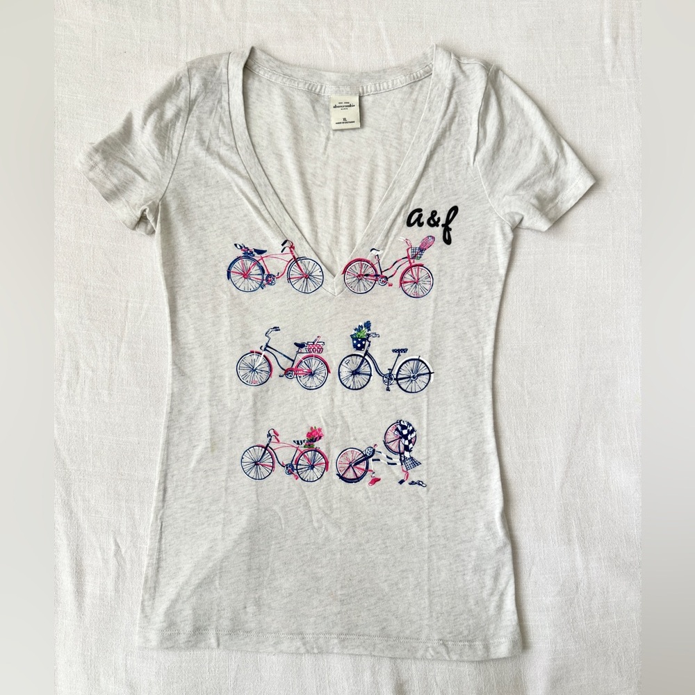 Vintage Y2K Abercrombie & Fitch v-neck tee with bicycle graphic